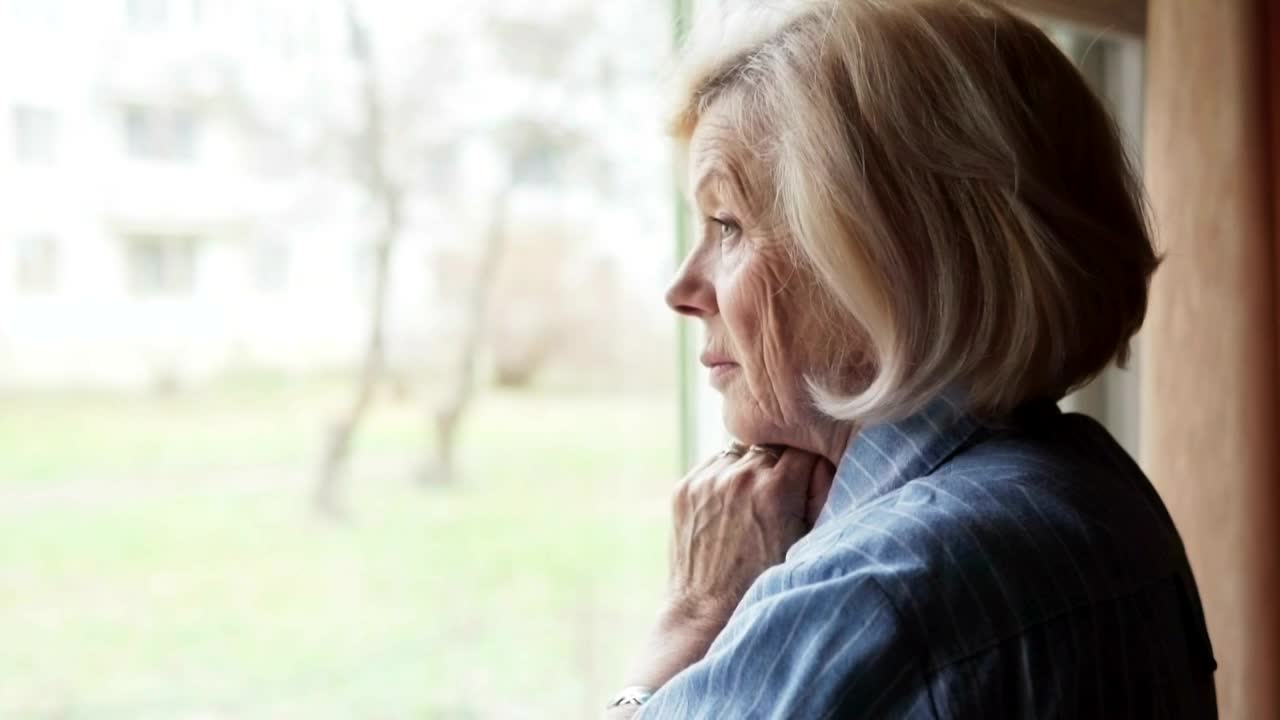 Stock Footage Worried Woman At The Window Live Wallpaper Free