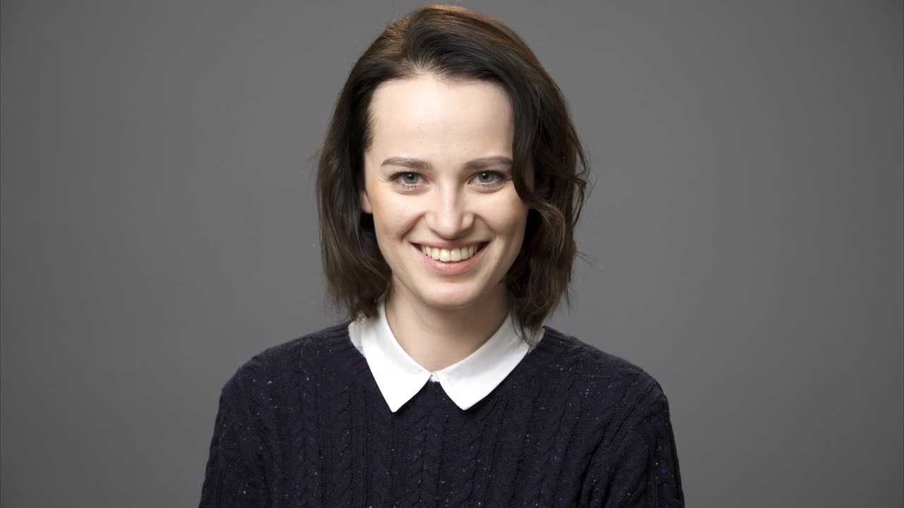 Stock Footage Woman Smiling While Laughing Gently Live Wallpaper Free