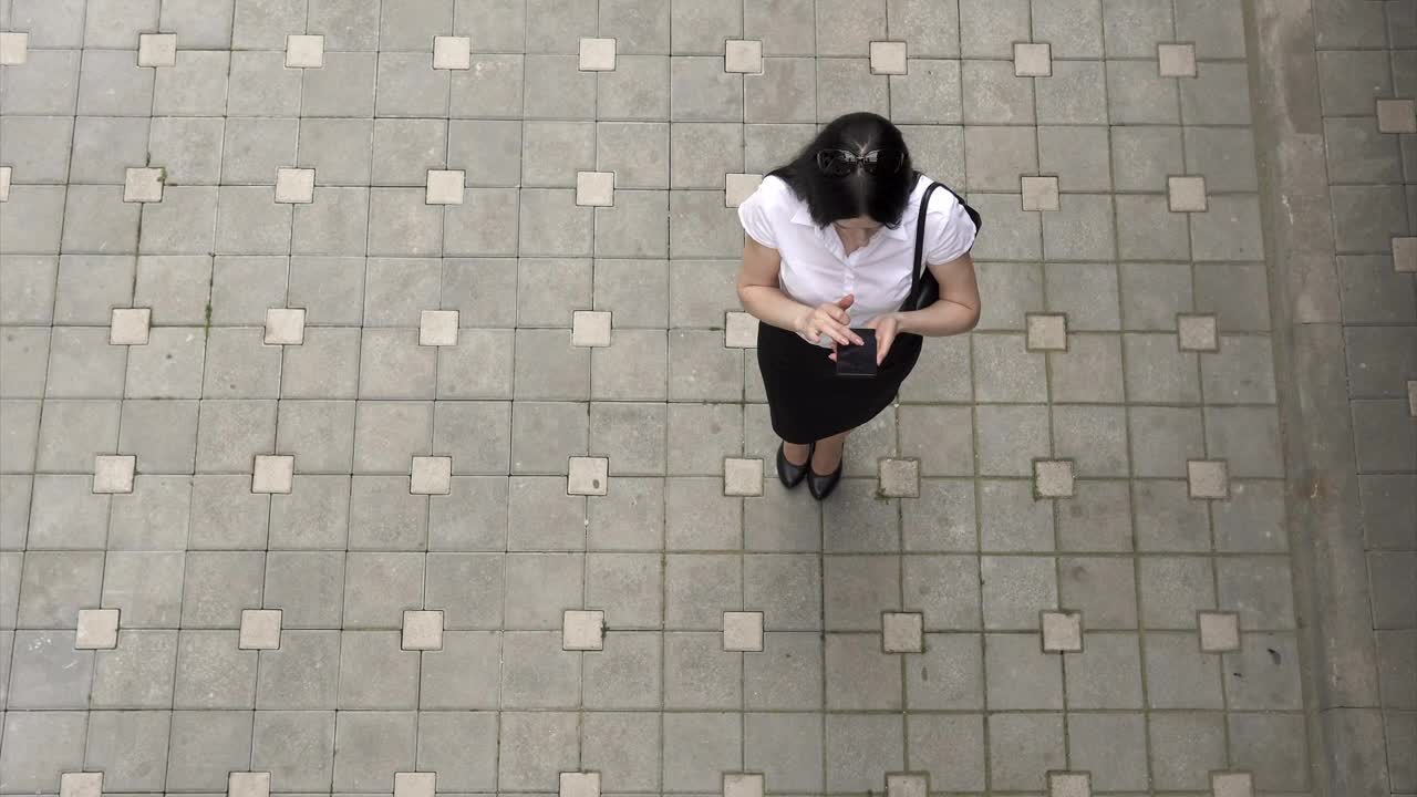 Stock Footage Woman Using Her Smartphone Outside Live Wallpaper Free