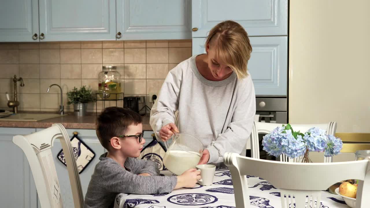 Stock Footage Young Boy Drinking Milk At The Table Live Wallpaper Free