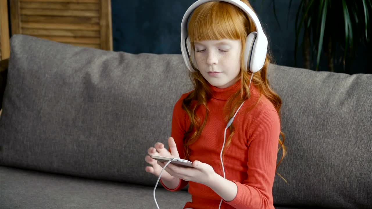 Stock Footage Young Child Listening To Music On A Phone Live Wallpaper Free