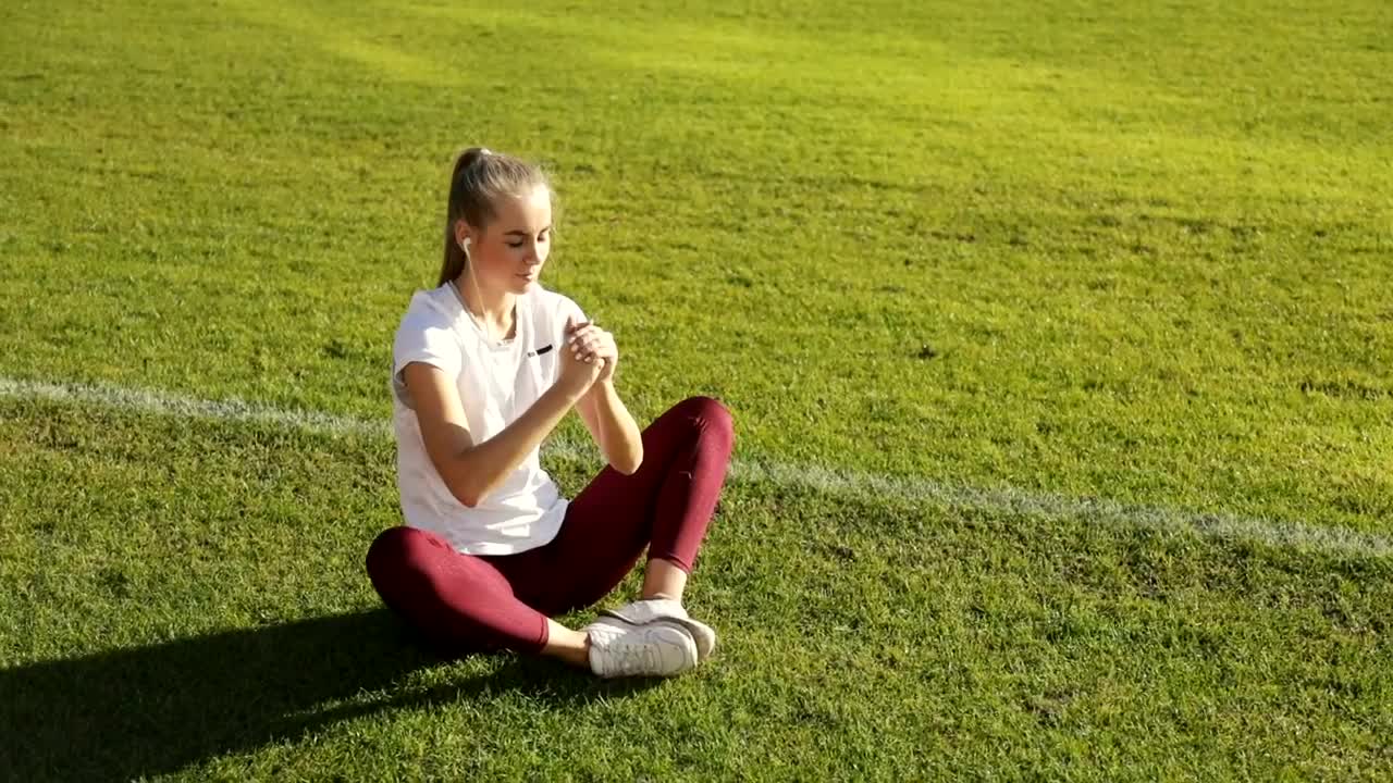 Stock Footage Young Runner Does Stretch Routine On Track Field Live Wallpaper Free