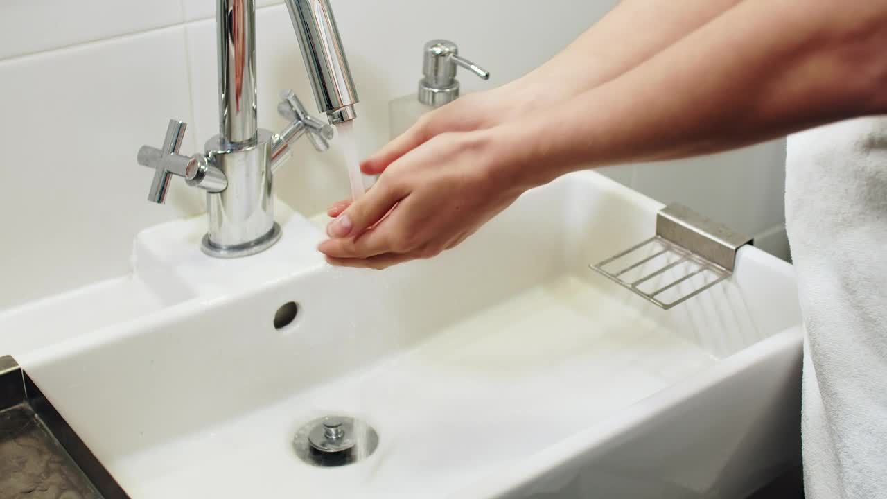 Stock Footage Woman Washing Hands In Bathroom Sink Live Wallpaper Free