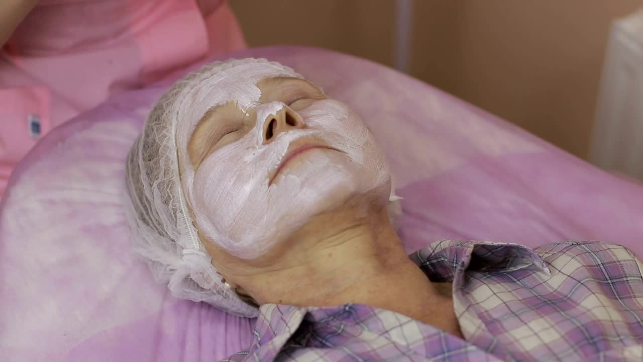 Stock Footage Woman Having A Face Treatment Applied Live Wallpaper Free