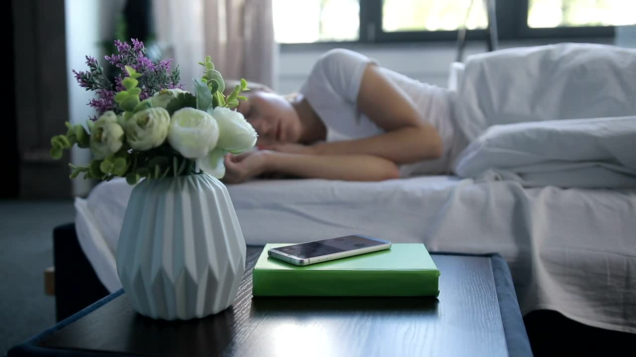 Stock Footage Woman Switching Off Her Alarm Live Wallpaper Free
