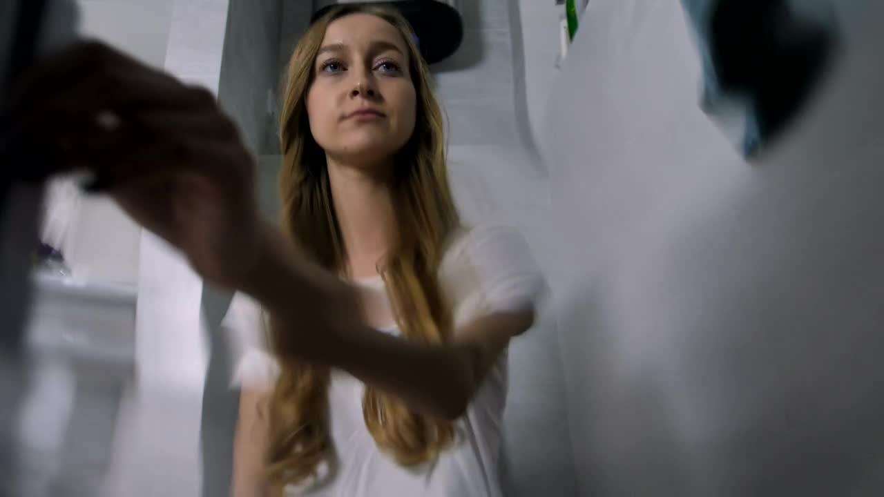 Stock Footage Young Woman Loading A Washing Machine Live Wallpaper Free