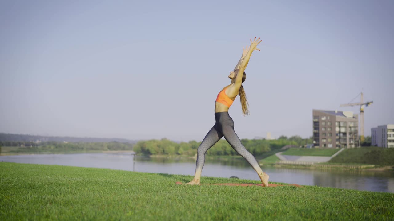 Stock Footage Woman Doing Yoga On The Grass Live Wallpaper Free