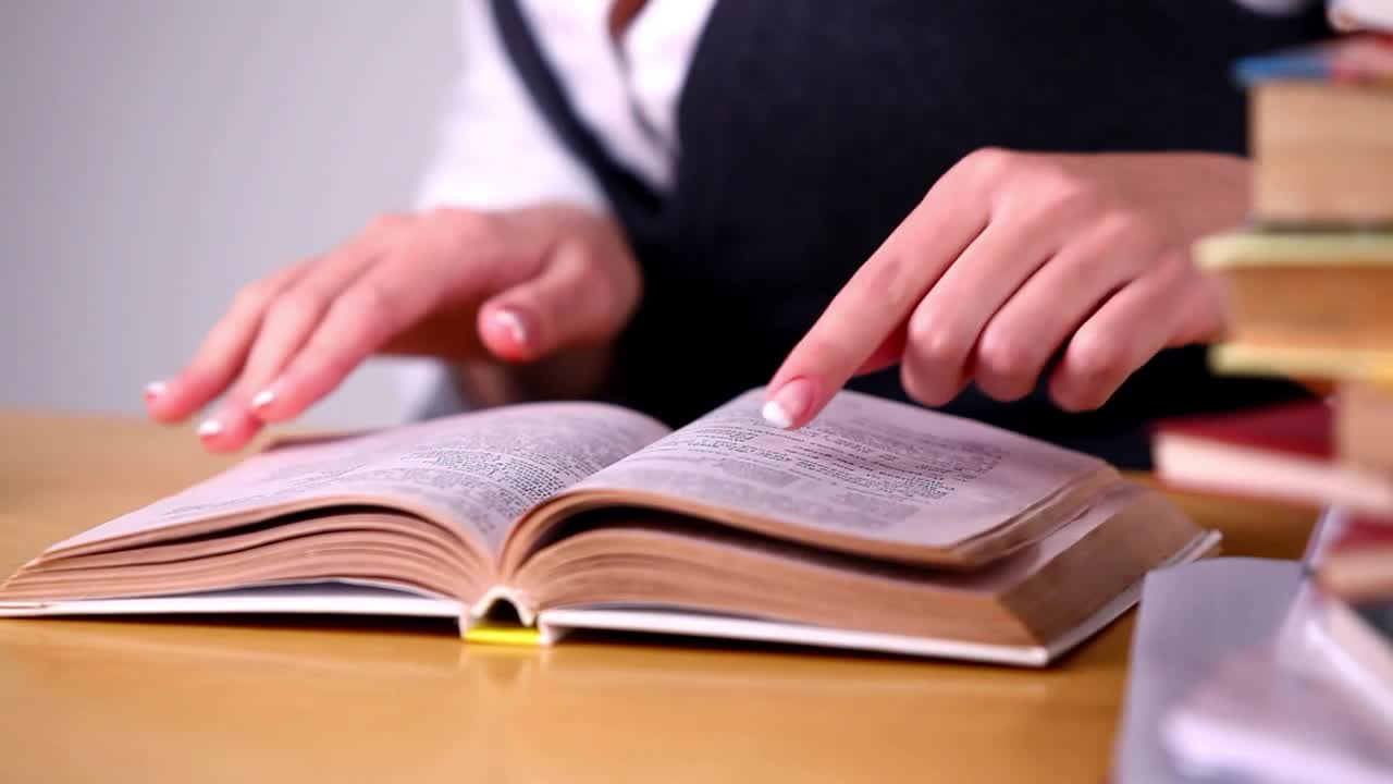 Stock Footage Woman Looking For Information In A Book At Library Live Wallpaper Free