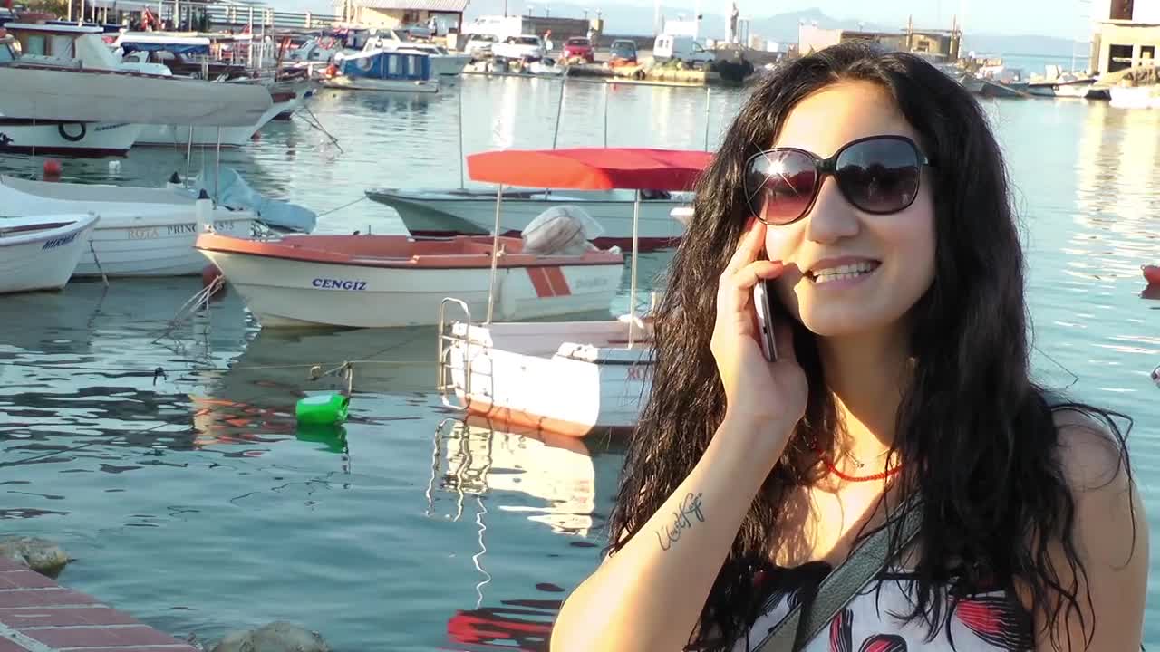 Stock Footage Woman Having A Call By The Port Live Wallpaper Free