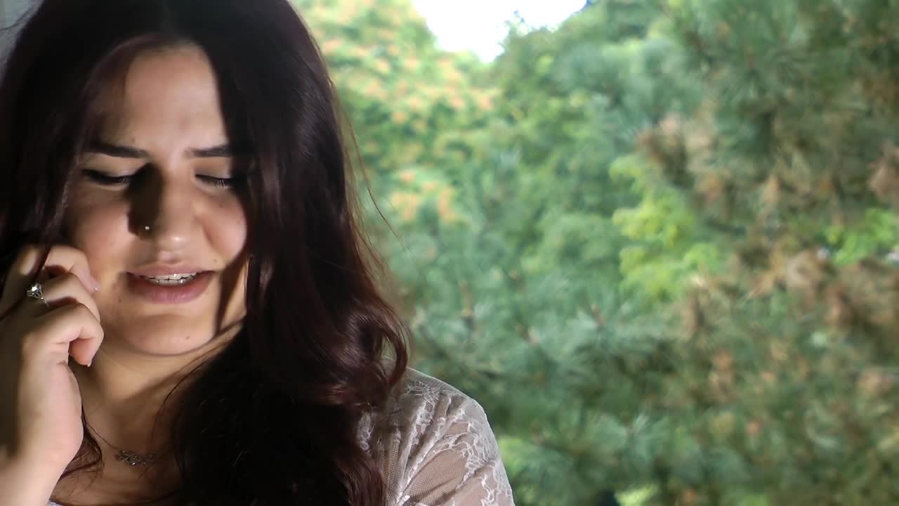 Stock Footage Young Happy Woman While Having A Call Live Wallpaper Free