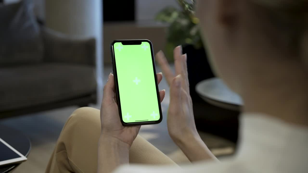 Stock Footage Woman Swiping Fingers On A Mobile Phone Live Wallpaper Free