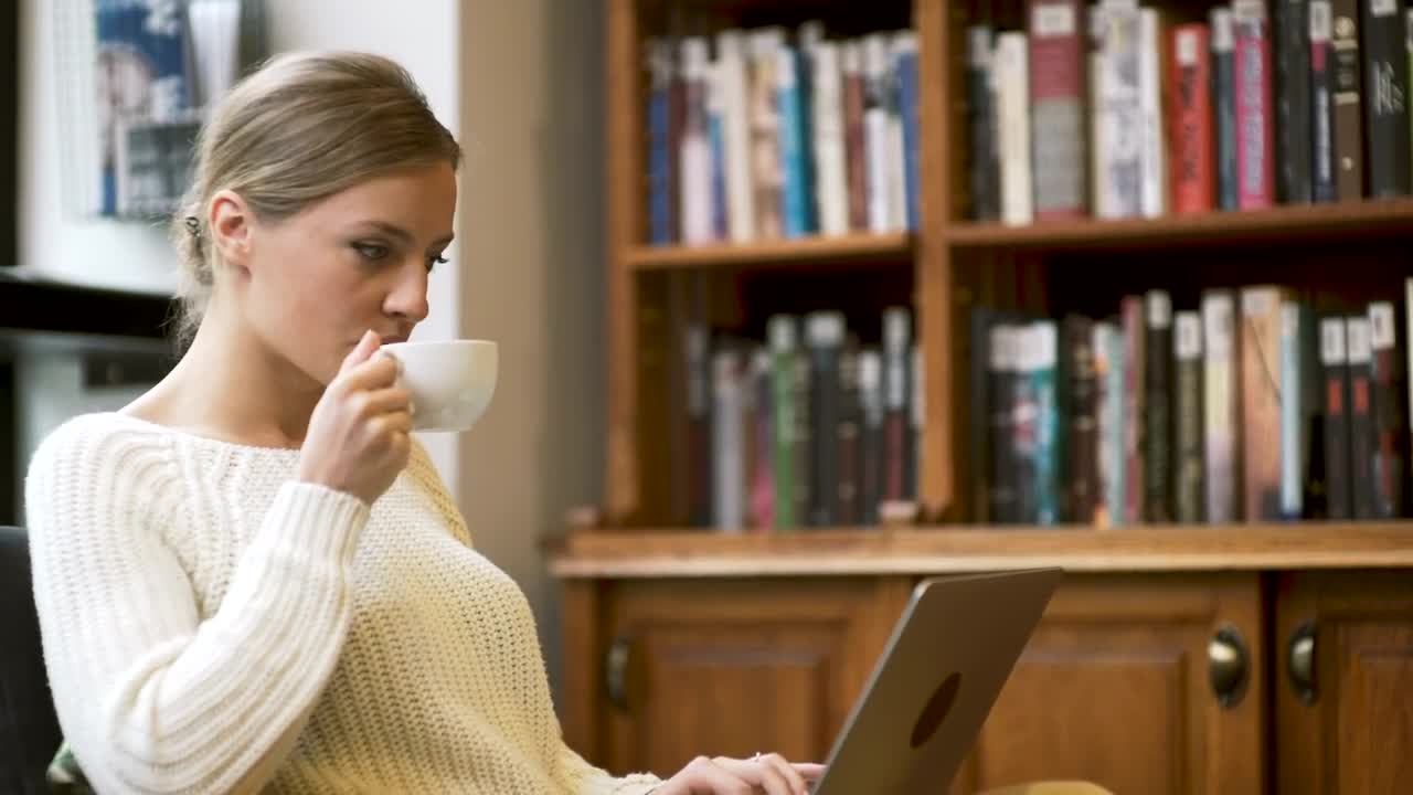 Stock Footage Woman Working At Home Drinking Tea Live Wallpaper Free