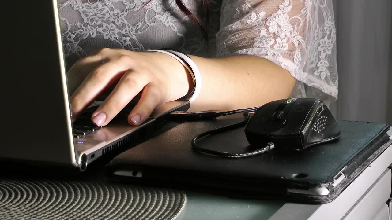 Stock Footage Woman Using Her Laptop At A Desk Medium Shot Live Wallpaper Free