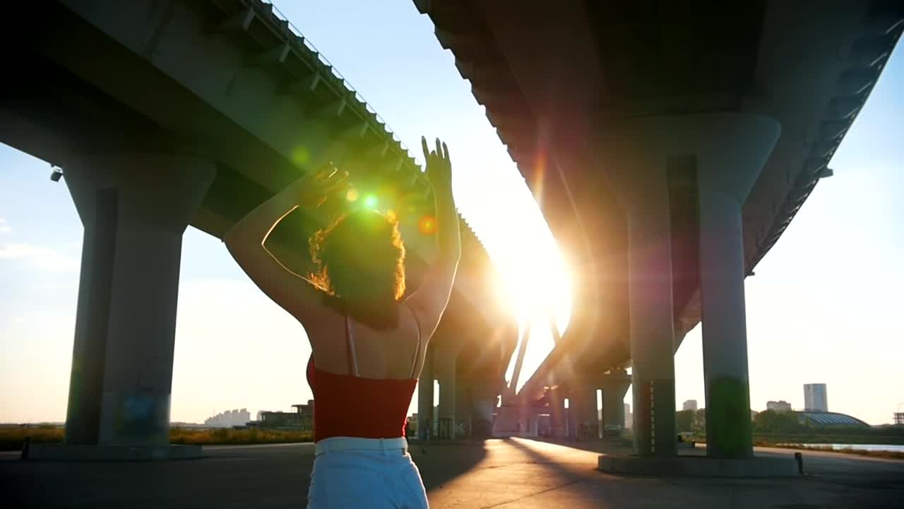Stock Footage Young Woman Skating Below A Bridge In The Sunlight Live Wallpaper Free