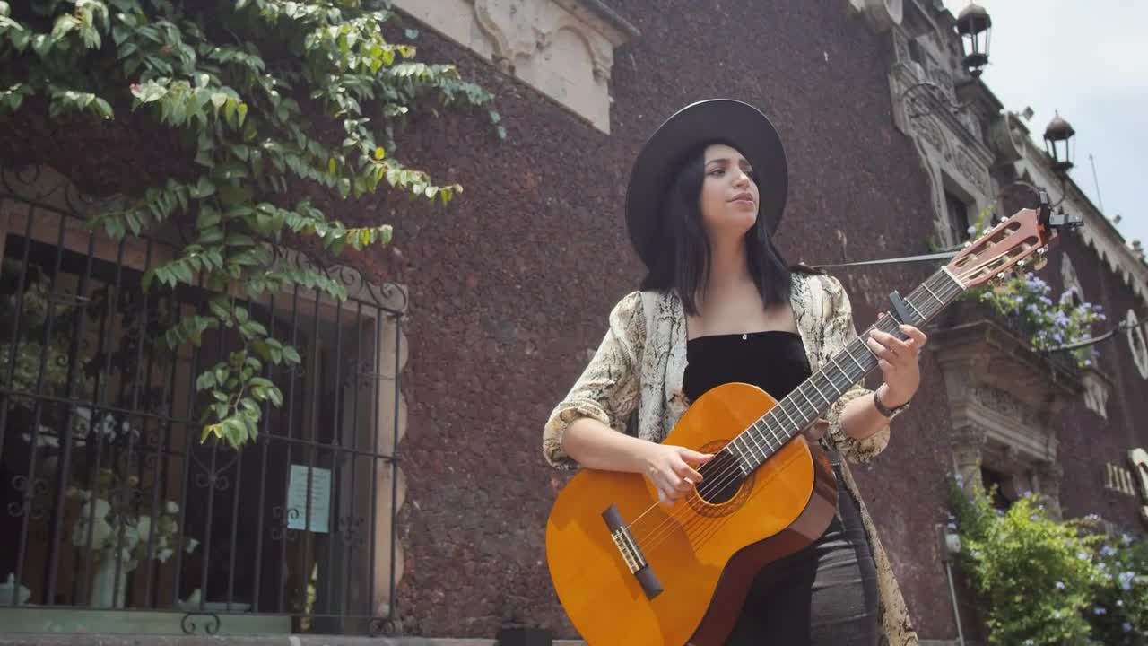 Stock Footage Young Woman Playing Guitar On An Old Street In The Live Wallpaper Free