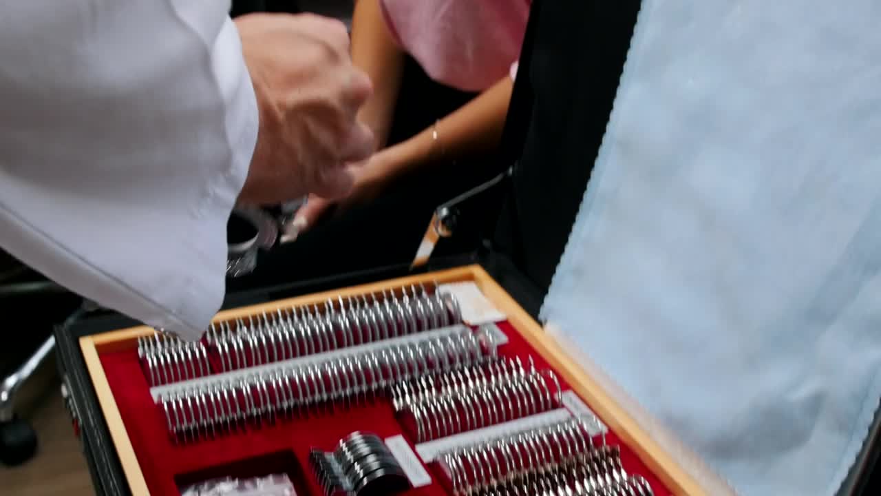 Stock Footage Woman Putting On A Vision Test Device Live Wallpaper Free