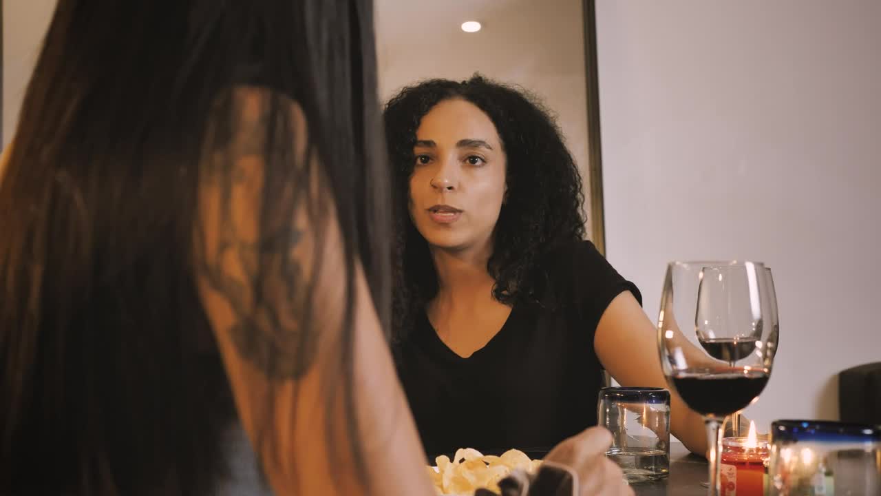 Stock Footage Young Women Make A Toast During A Dinner Live Wallpaper Free