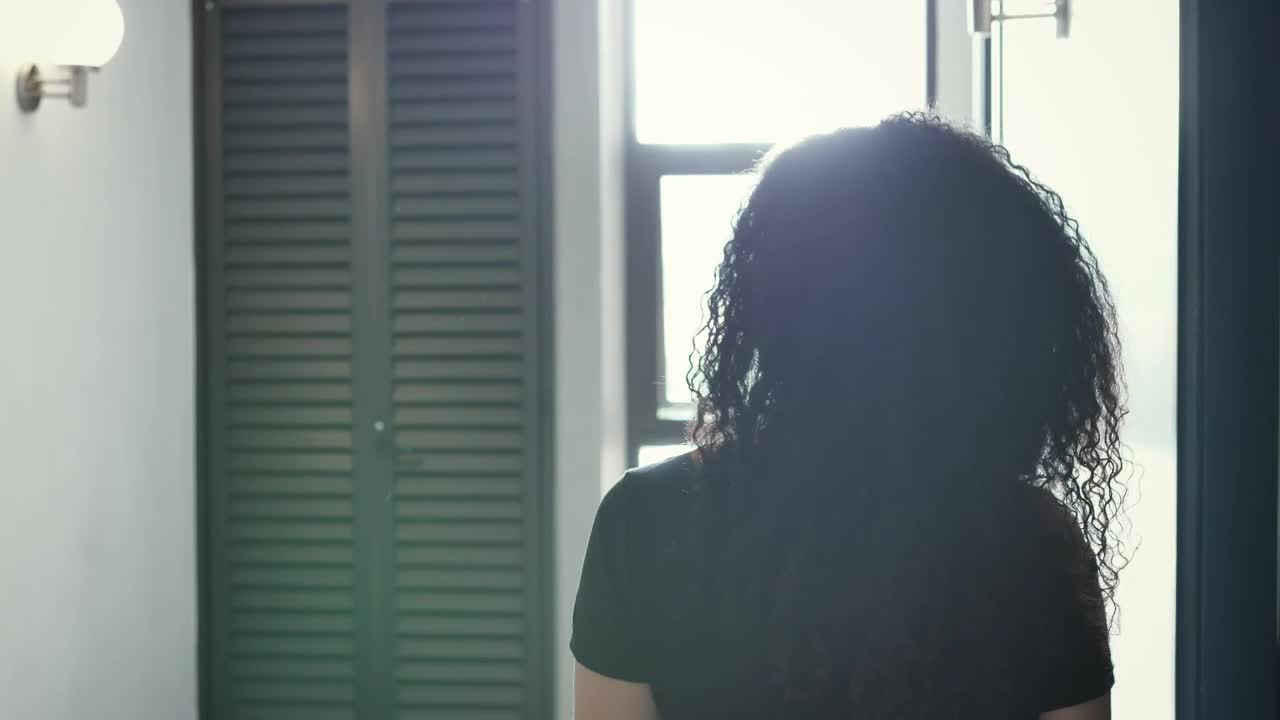 Stock Footage Young Woman Is Greeted At Her Friends Apartment Live Wallpaper Free