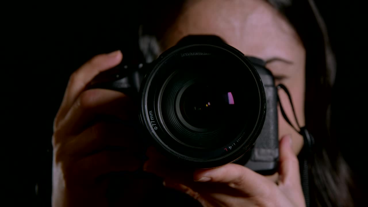 Stock Footage Woman Using A Camera Live Wallpaper Free