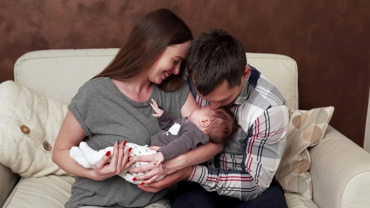 Stock Footage Young Couple With Their Baby Live Wallpaper Free