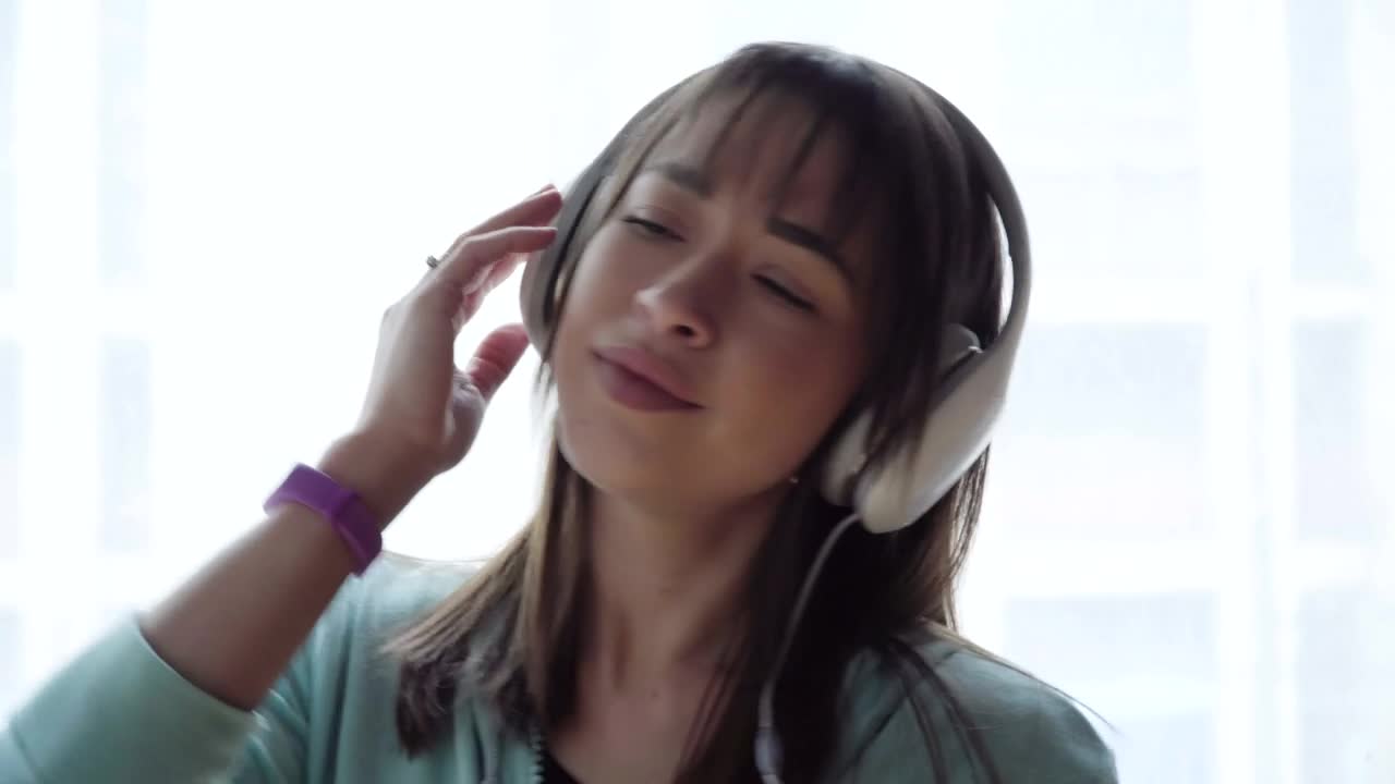 Stock Footage Woman Enjoying A New Song Live Wallpaper Free