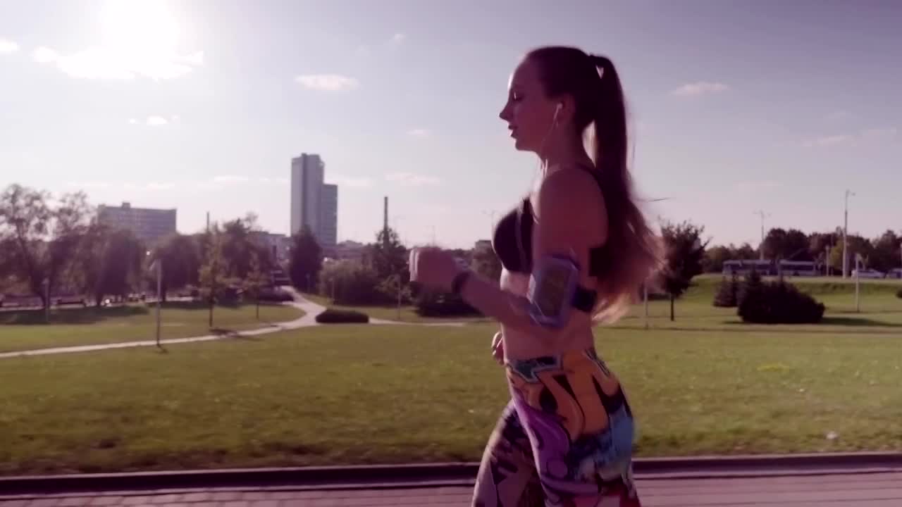 Stock Footage Woman Running Through A Park Live Wallpaper Free