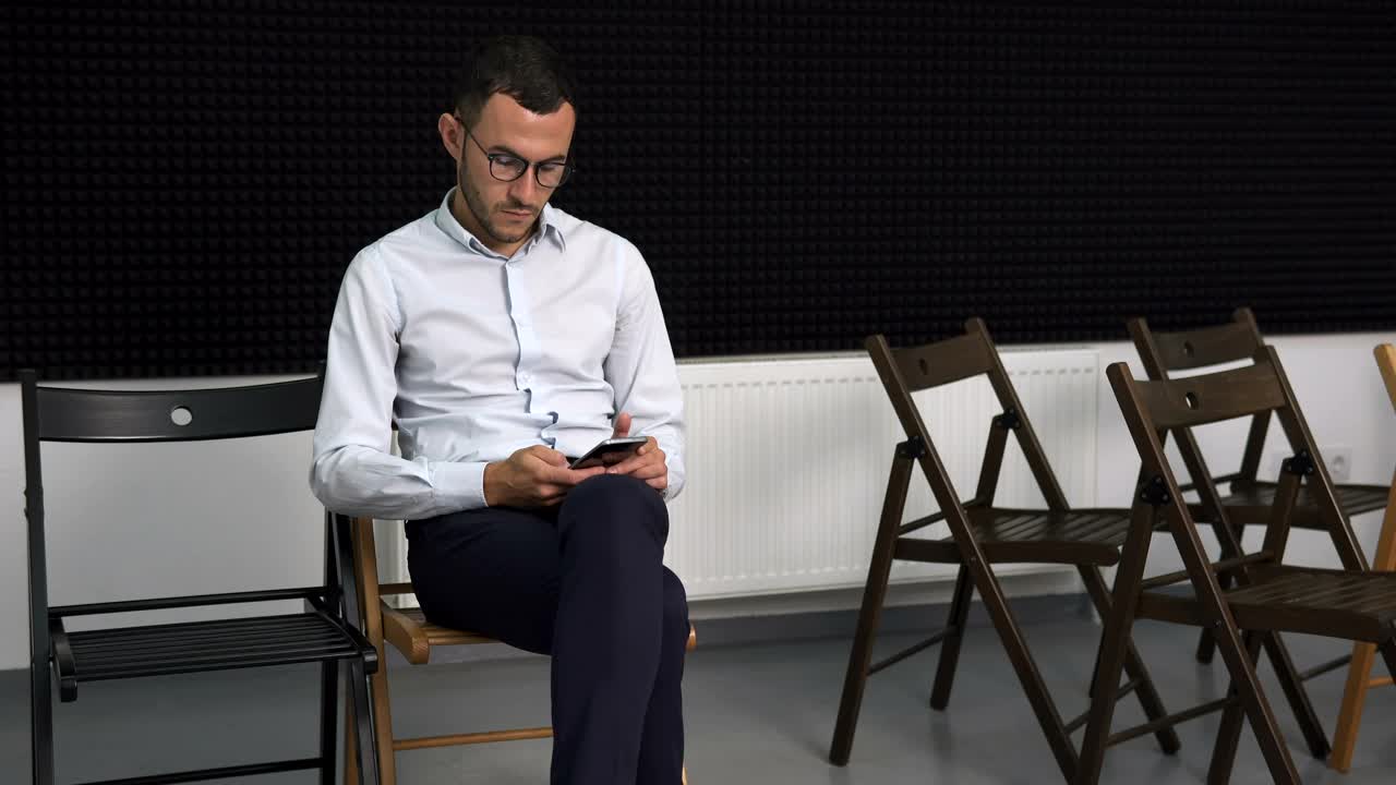 Stock Footage Young Man On His Phone At Work Live Wallpaper Free