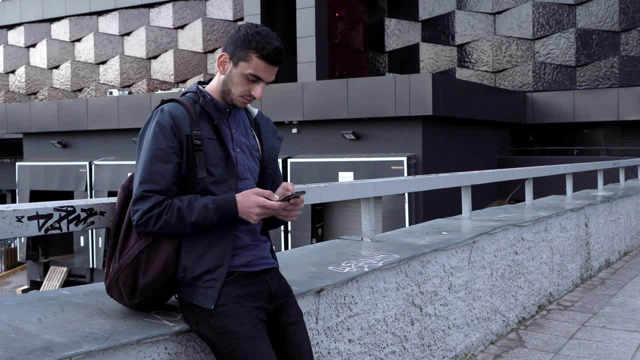 Stock Footage Young Man Texting In The City Live Wallpaper Free