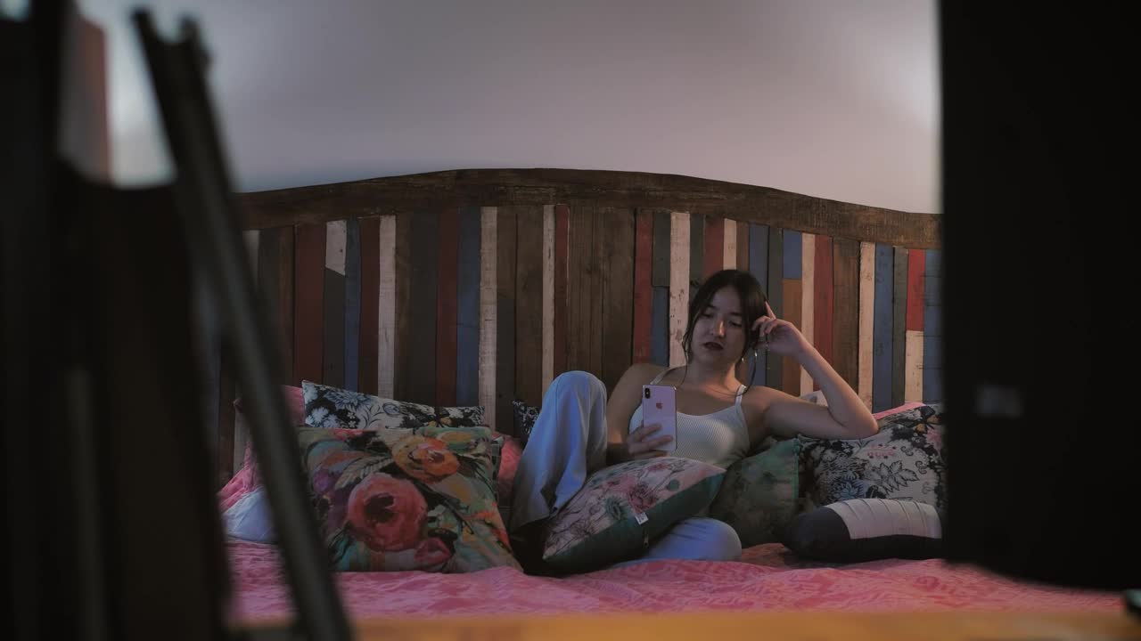 Stock Footage Young Woman Talking On Video Call Lying On Her Bed Live Wallpaper Free