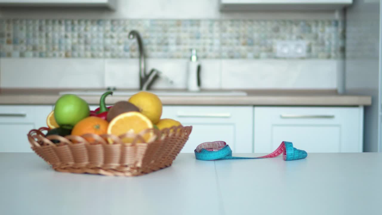 Stock Footage Woman Measuring Her Waist In The Kitchen Live Wallpaper Free