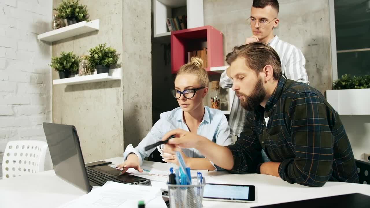 Stock Footage Young Work Team Out Idea On Laptop In Modern Office Live Wallpaper Free