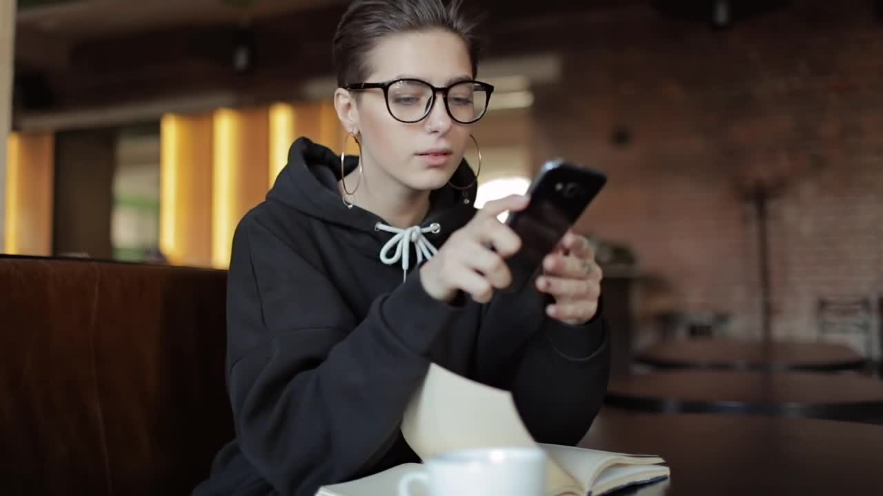 Stock Footage Woman Smiles In Surprise At Social Media Post Live Wallpaper Free