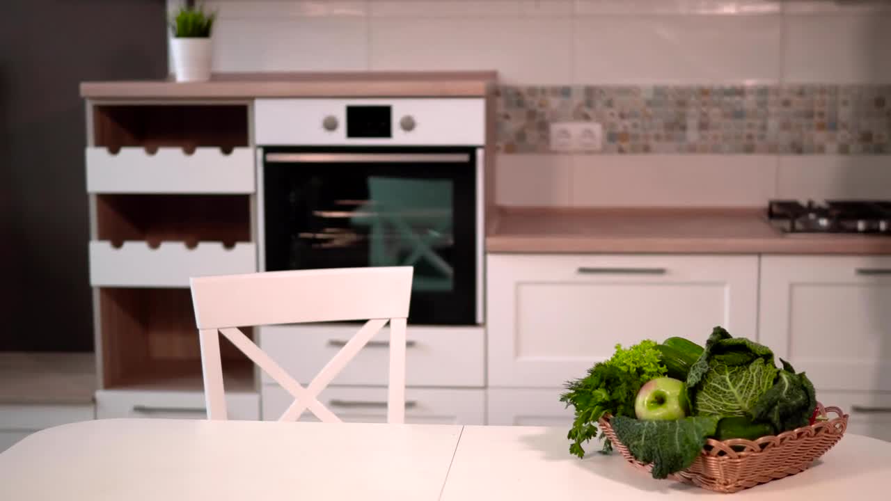 Stock Footage Woman Unpacks Groceries On Kitchen Table Live Wallpaper Free