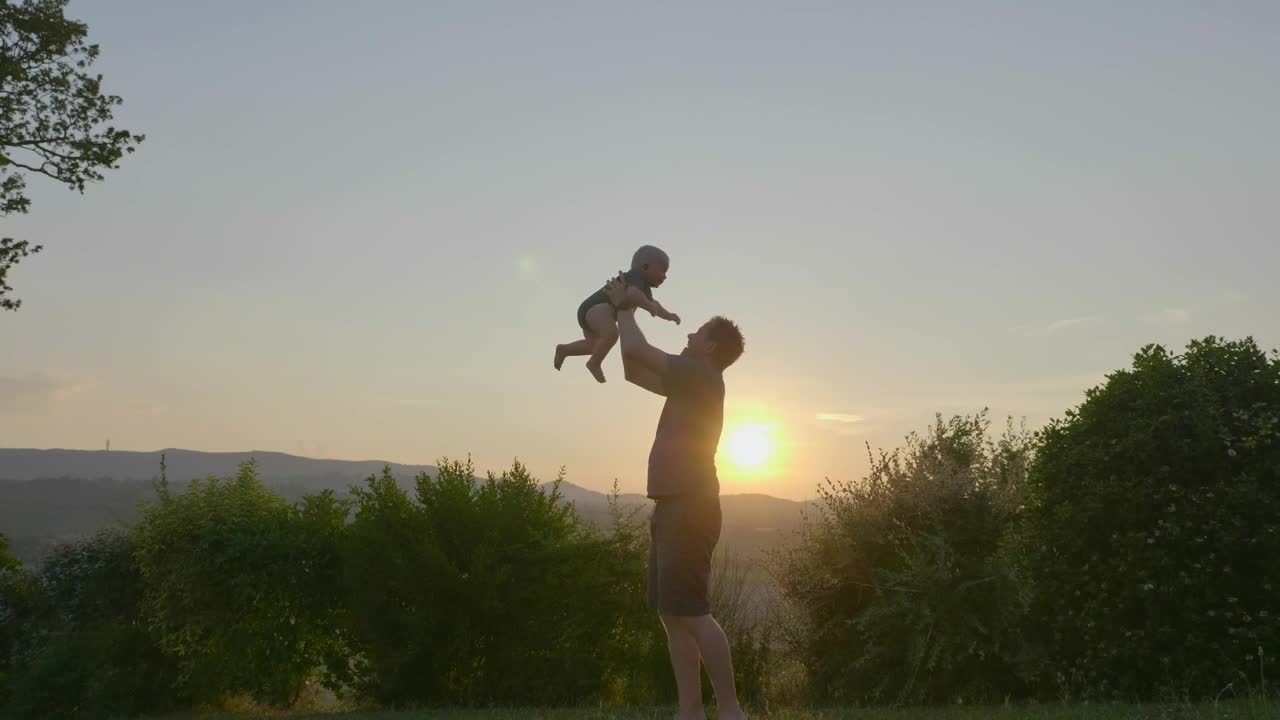 Stock Footage Young Baby Being Raised In The Air Live Wallpaper Free