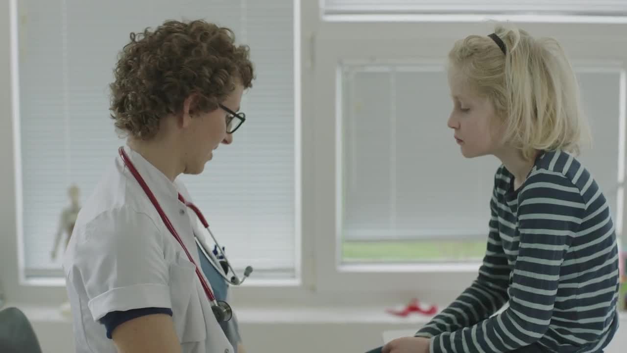 Stock Footage Young Boy Speaking To A Doctor Live Wallpaper Free