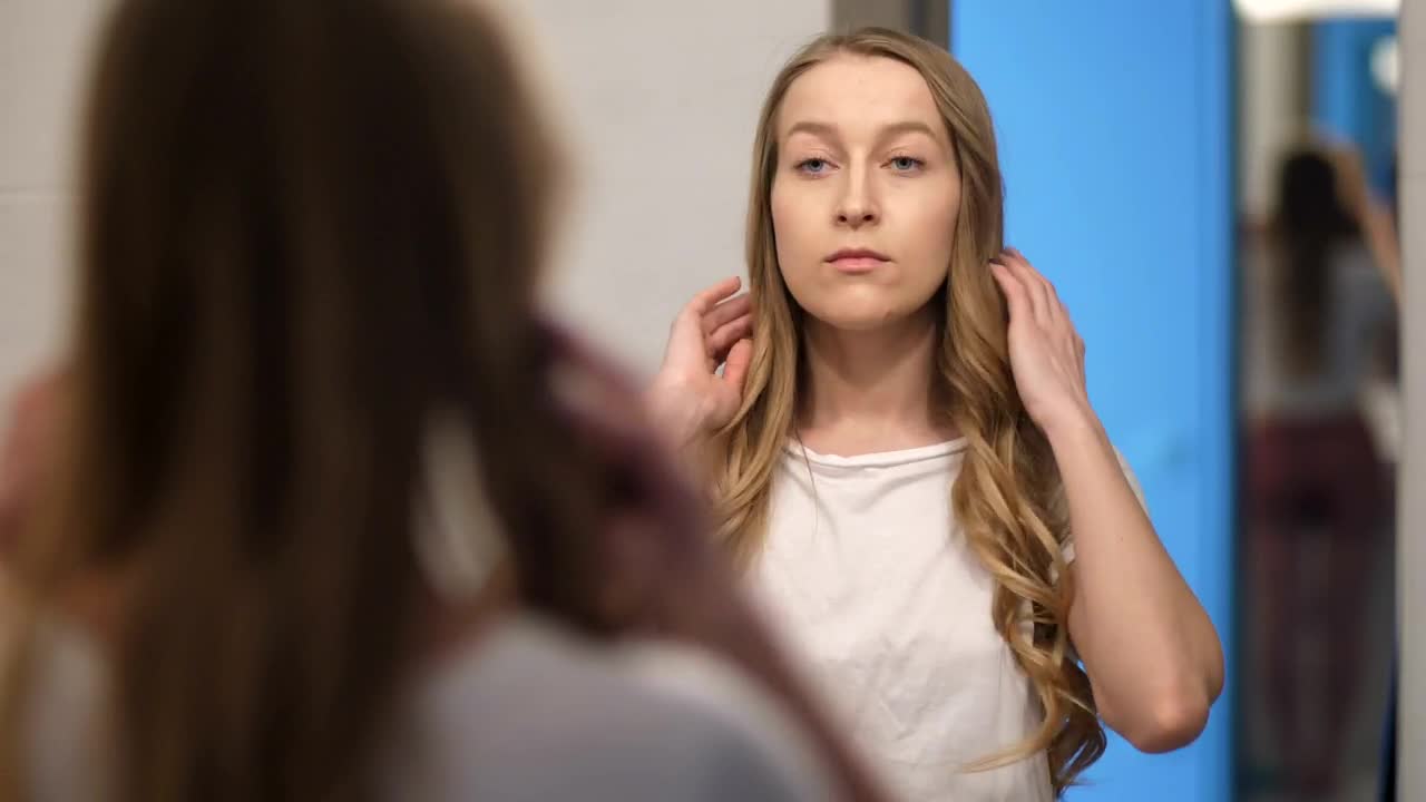 Stock Footage Woman Viewing Herself In The Mirror Live Wallpaper Free