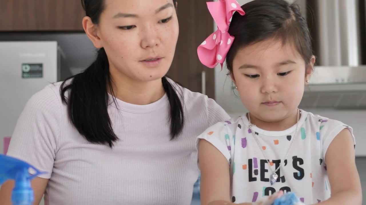 Stock Footage Woman With Her Daughter Washing Dishes Together Live Wallpaper Free