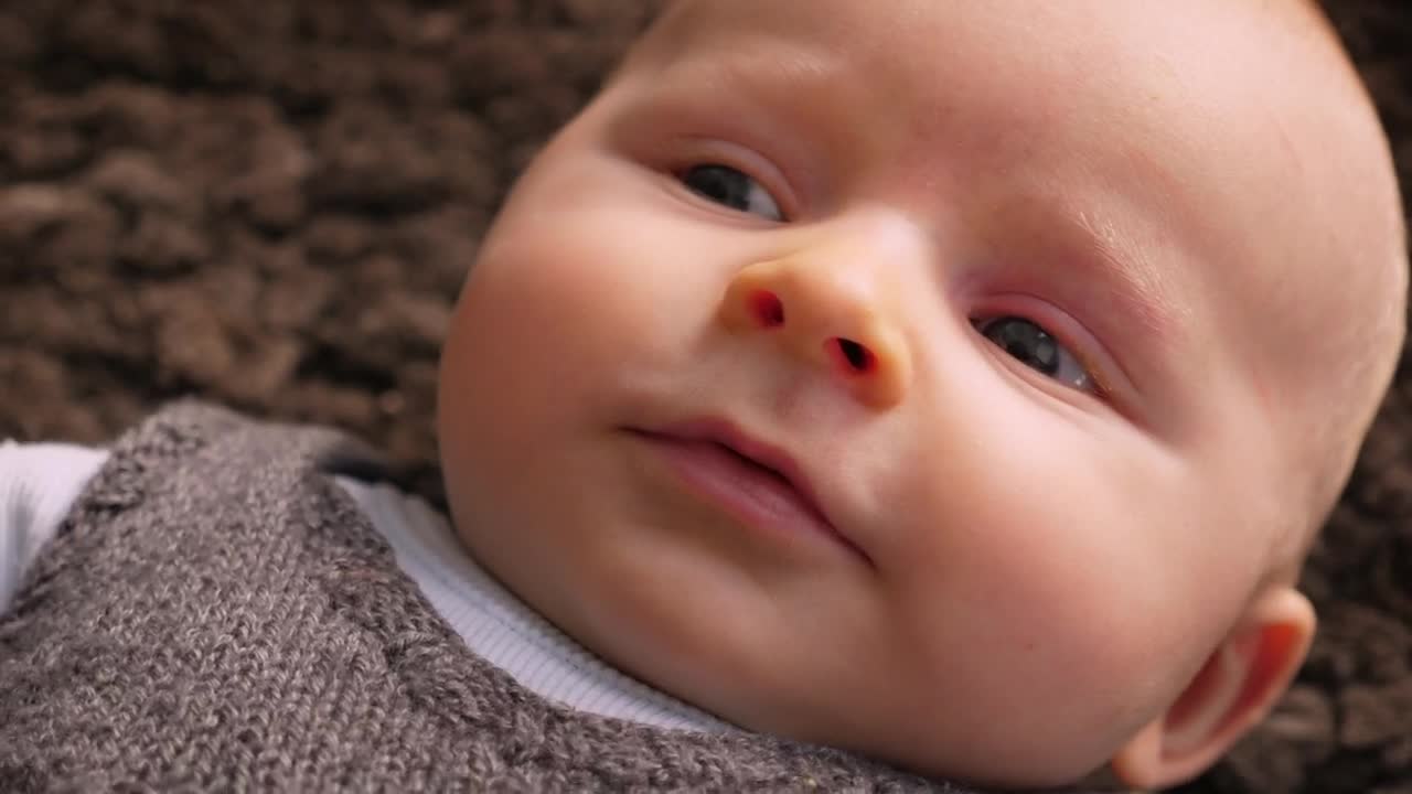 Stock Footage Young Baby Laying On The Floor Live Wallpaper Free