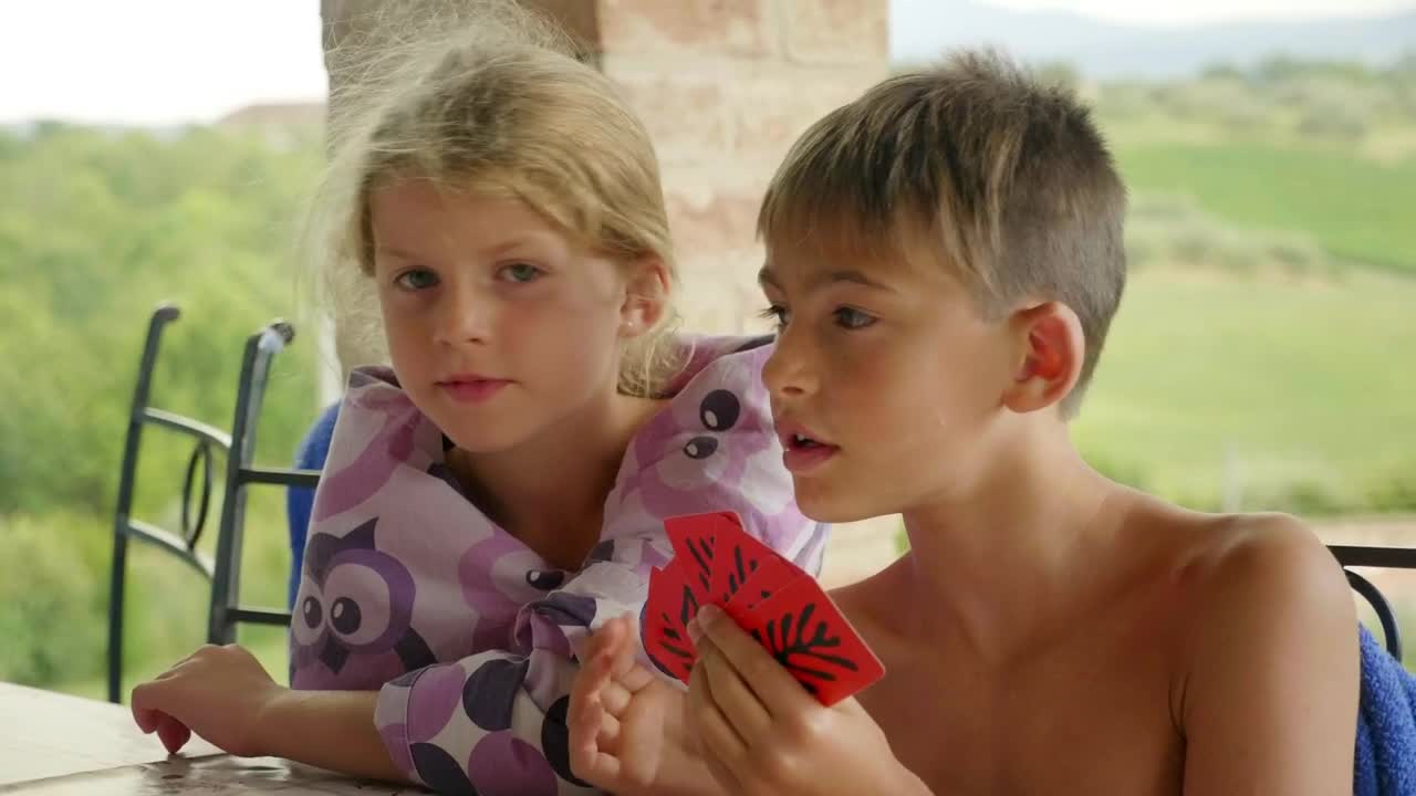 Stock Footage Young Children Playing With Cards Live Wallpaper Free