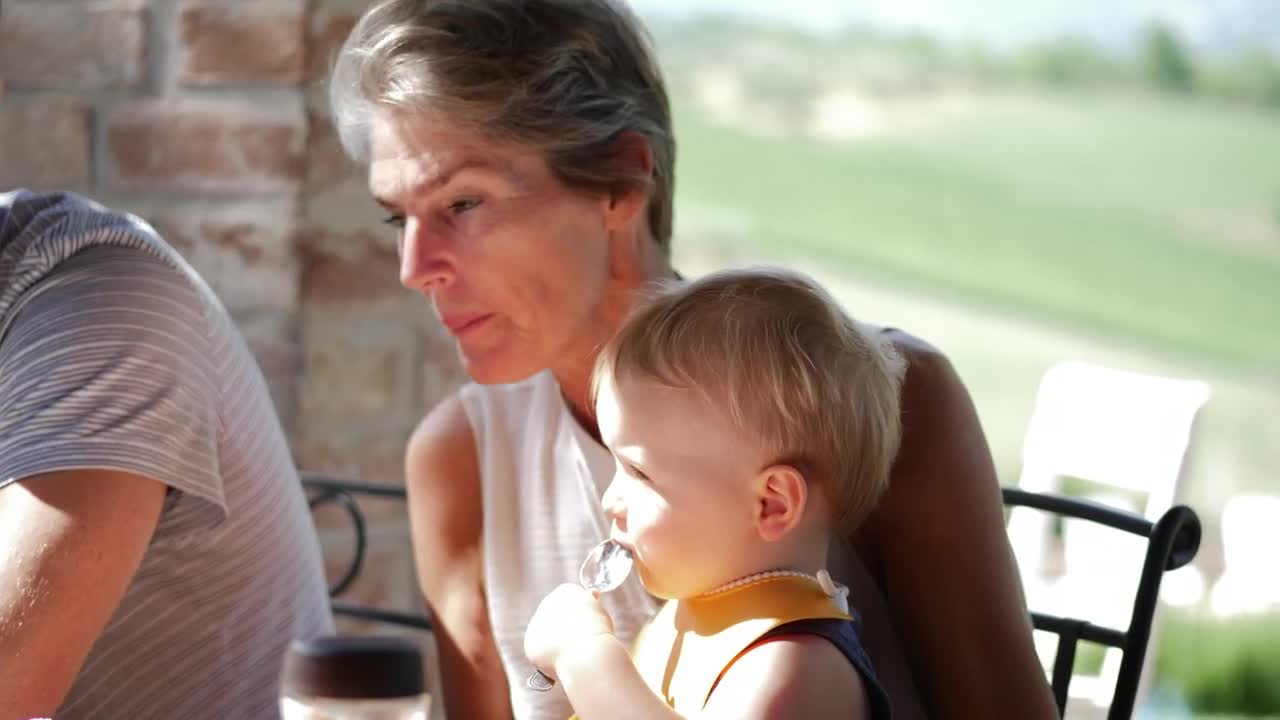 Stock Footage Woman Holding A Young Child Live Wallpaper Free