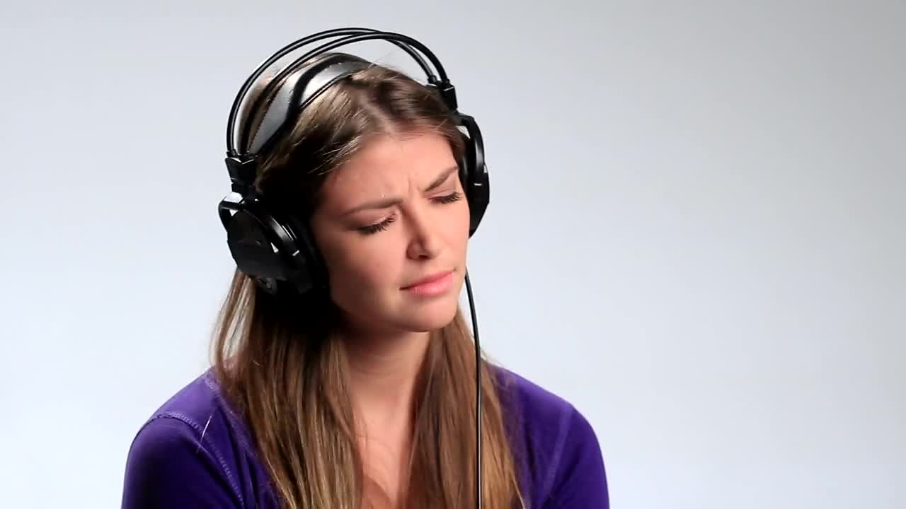 Stock Footage Woman With Headphones Listening To Music Live Wallpaper Free