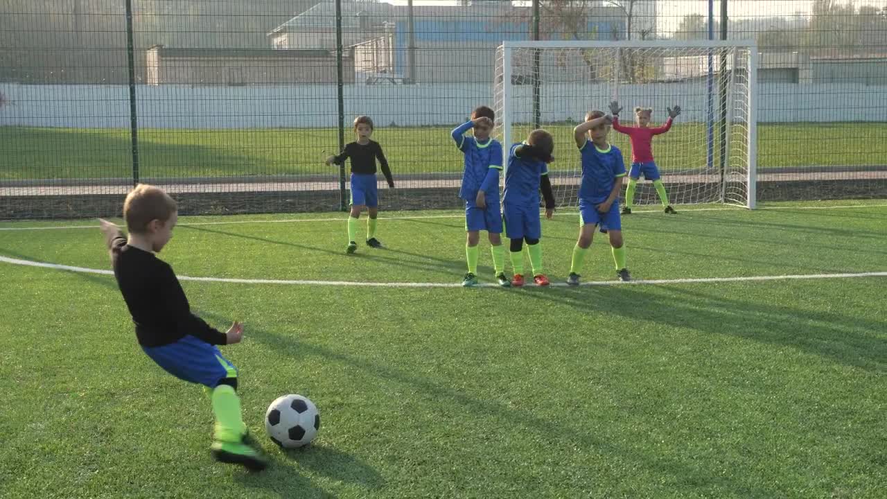 Stock Footage Young Boy Scoring A Goal From A Free Kick Live Wallpaper Free