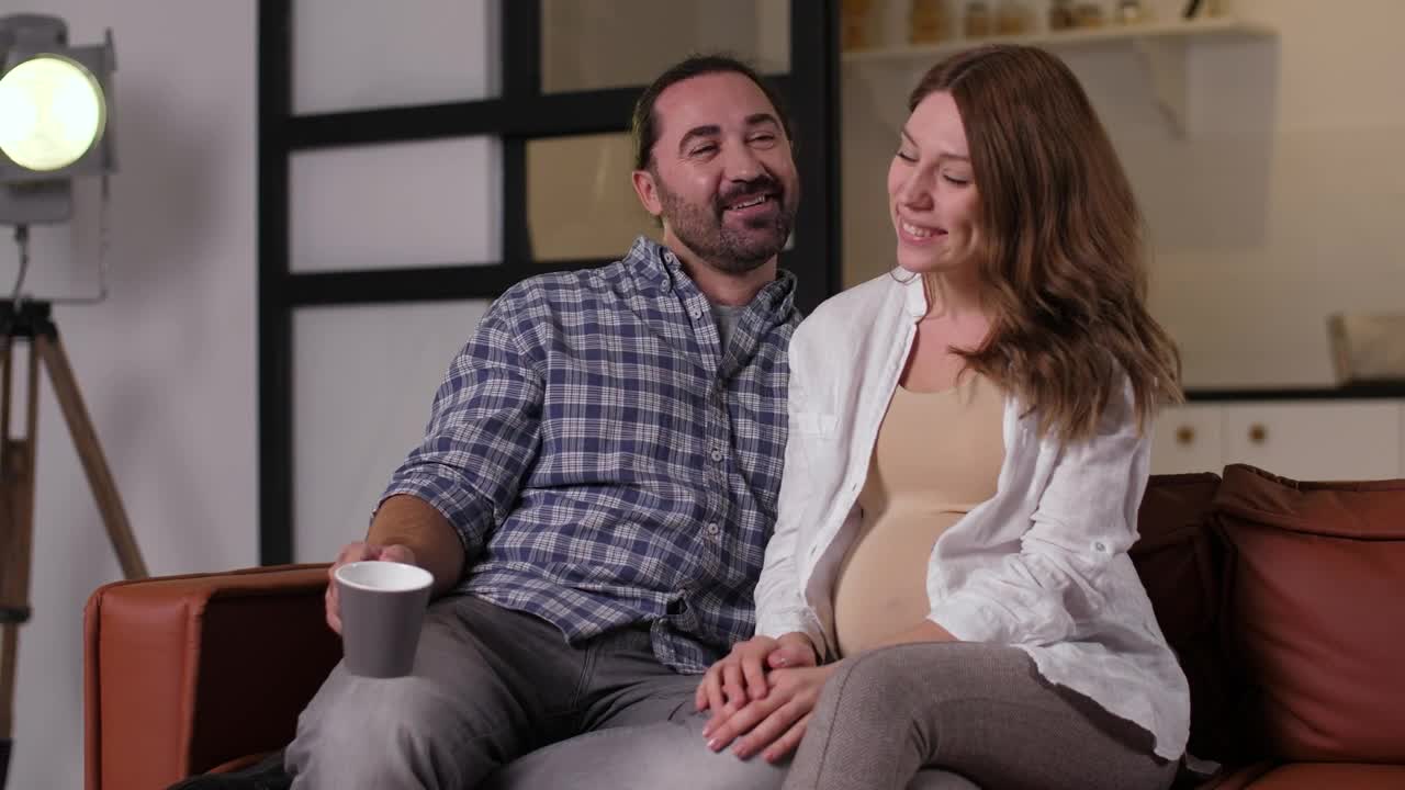 Stock Footage Young Couple Sharing A Joke Live Wallpaper Free