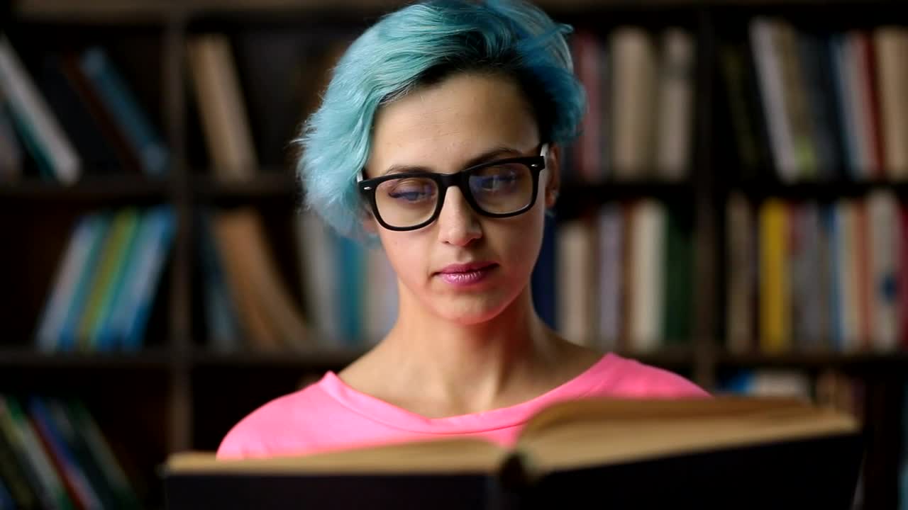 Stock Footage Woman With Glasses Reading A Book Live Wallpaper Free
