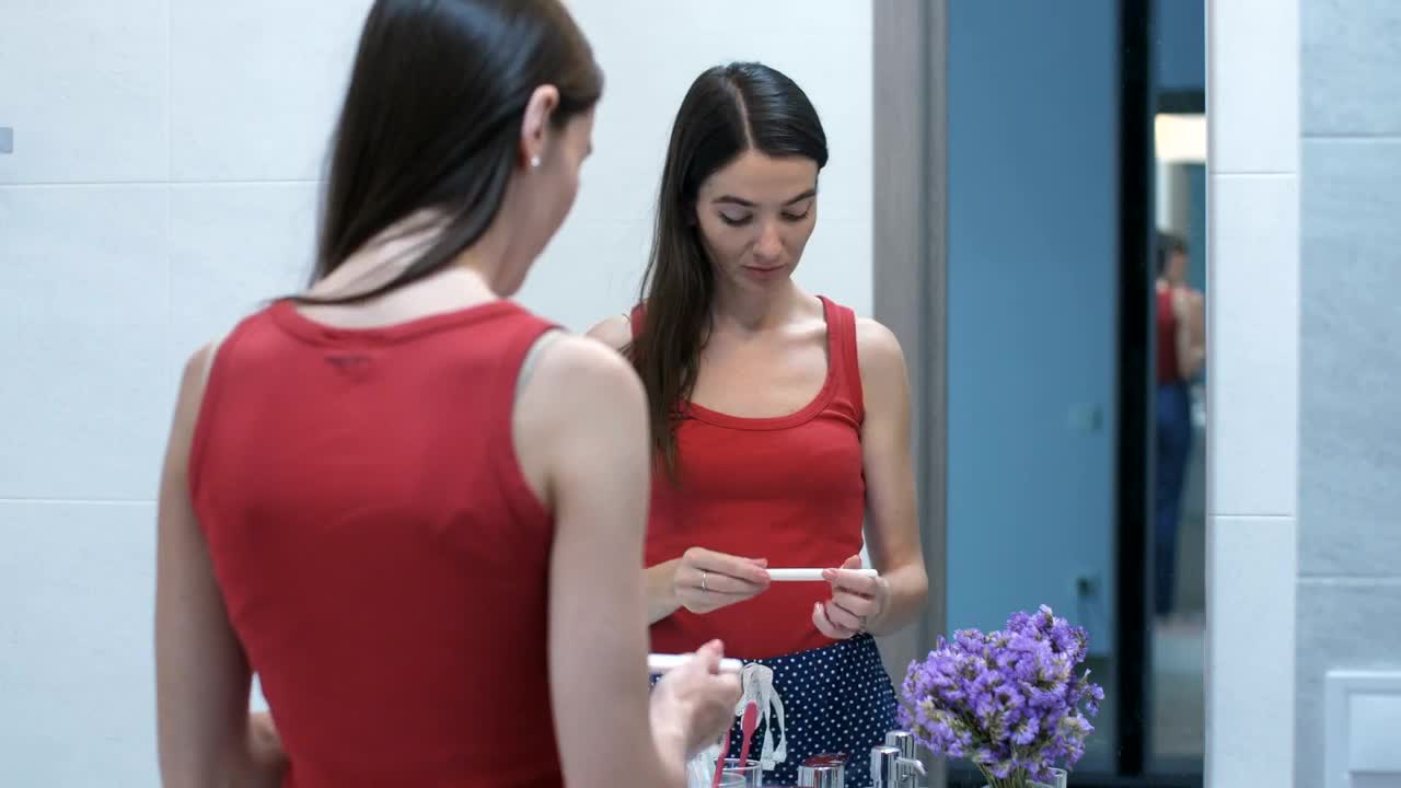 Stock Footage Woman Unhappy With Her Pregnancy Test Live Wallpaper Free