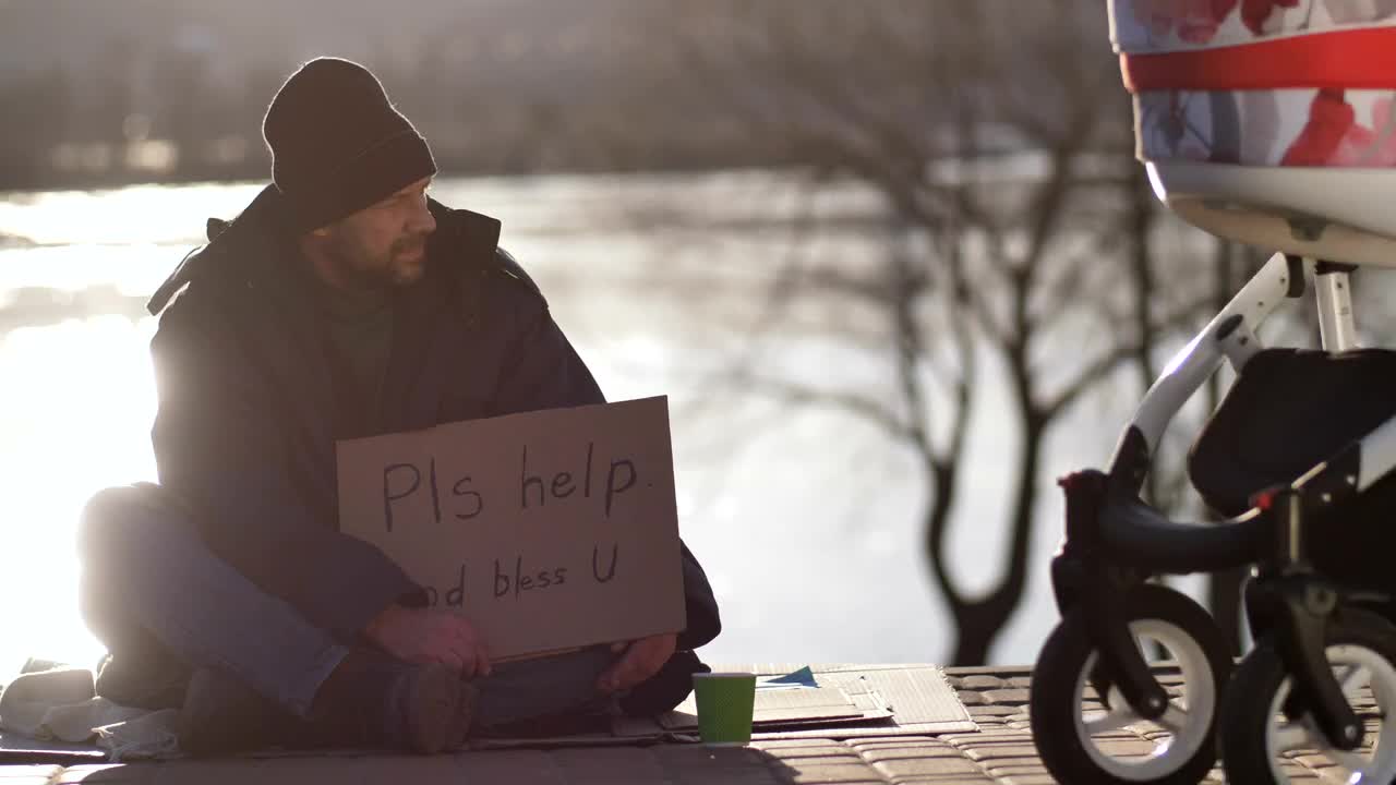 Stock Footage Woman Offering A Homeless Man Money Live Wallpaper Free