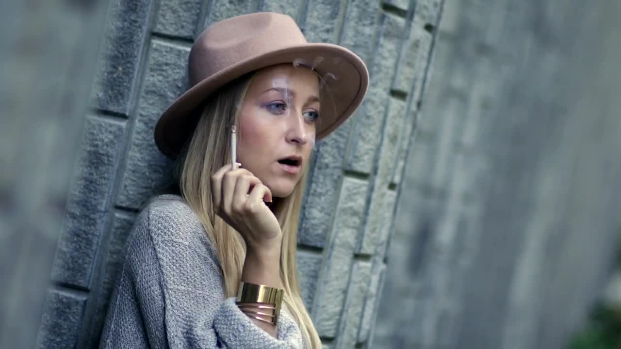 Stock Footage Woman Having A Cigarette Break Live Wallpaper Free