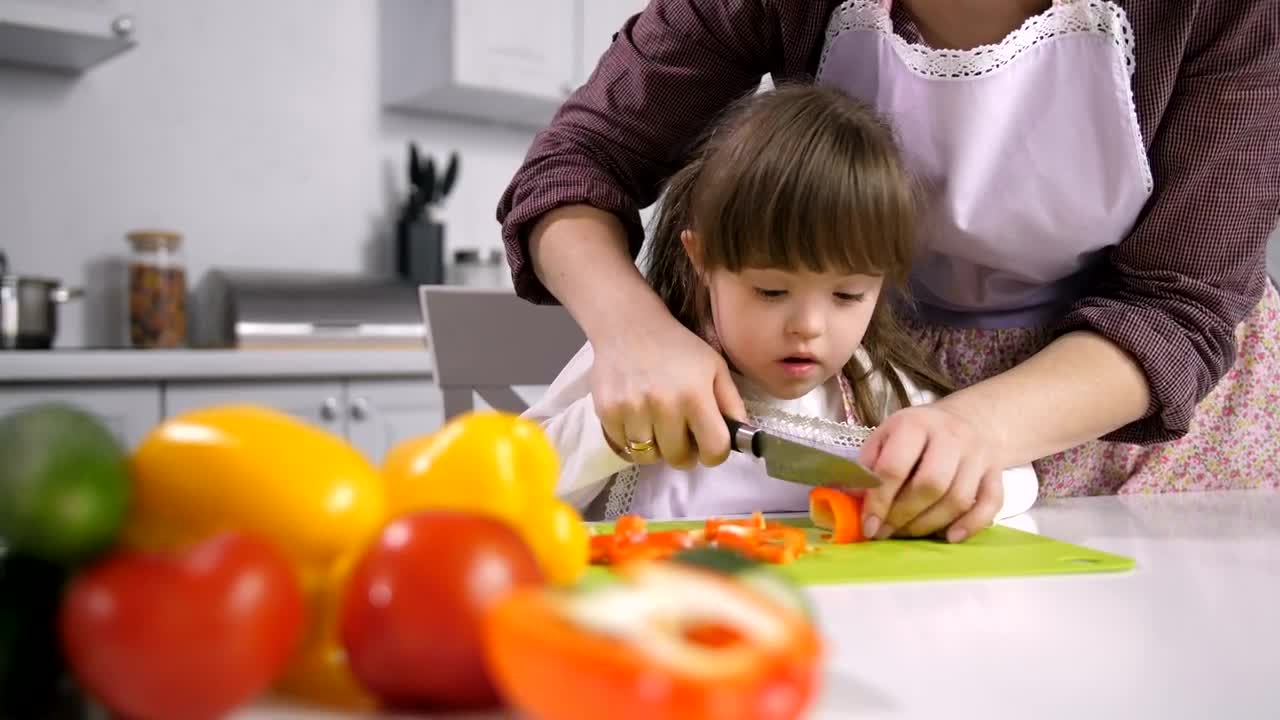 Stock Footage Young Girl Cutting Peppers Live Wallpaper Free