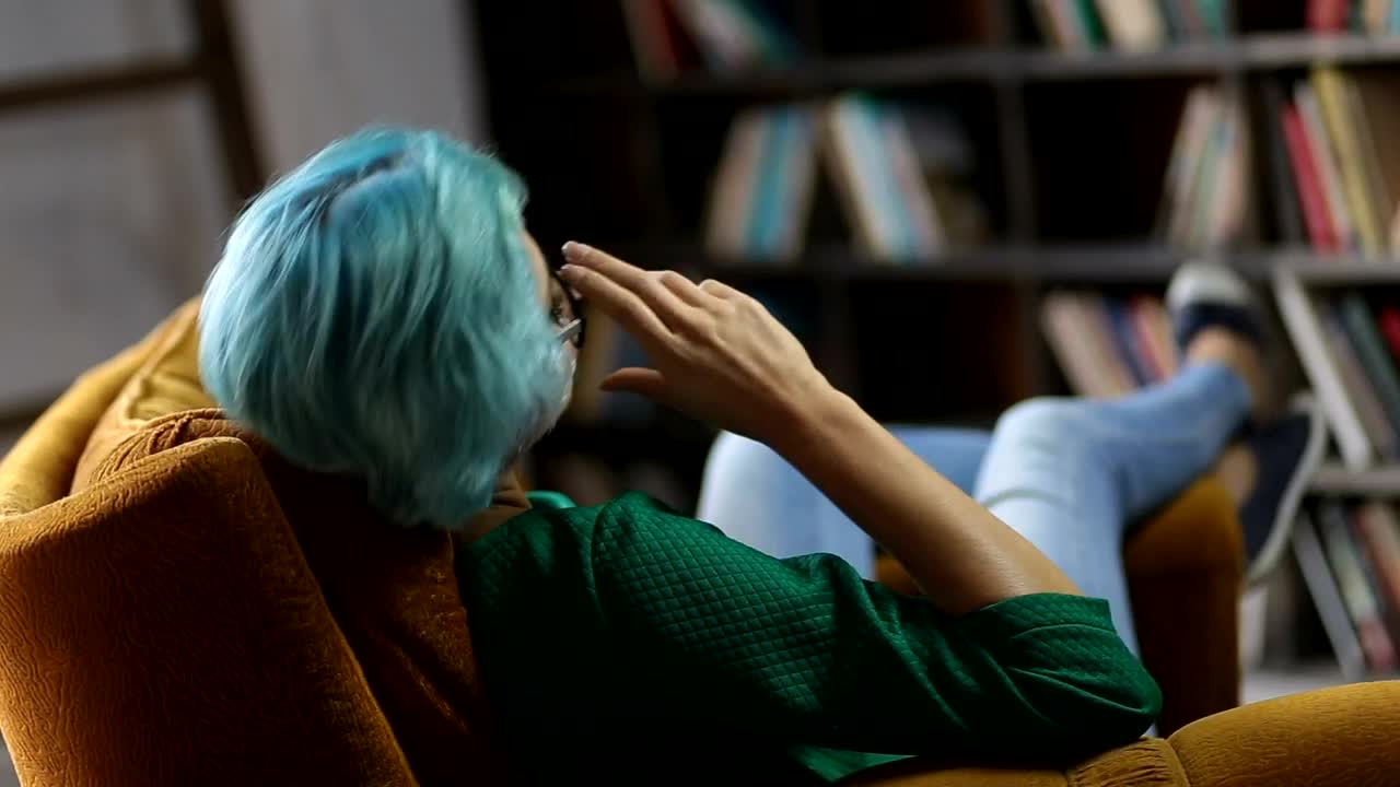 Stock Footage Woman Relaxing In The Library Live Wallpaper Free