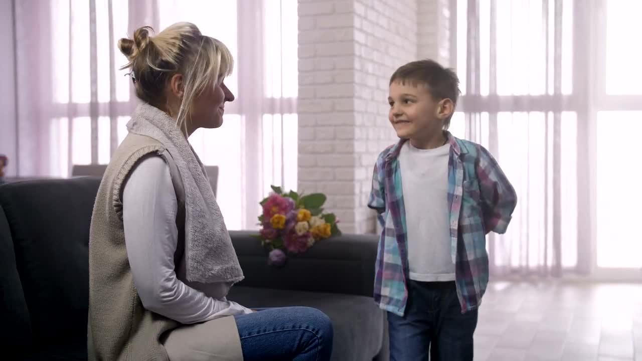 Stock Footage Young Boy Giving His Mother A Gift Live Wallpaper Free